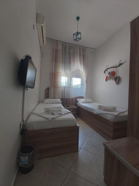Postel nebo postele na pokoji v ubytování Foça Mint Hotel