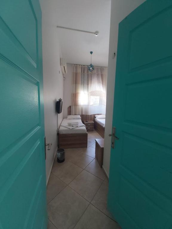 Postel nebo postele na pokoji v ubytování Foça Mint Hotel