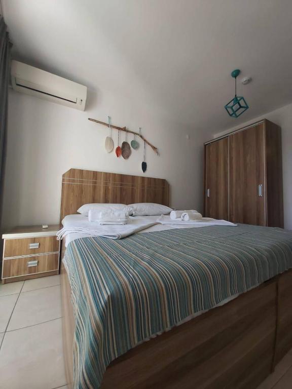 Postel nebo postele na pokoji v ubytování Foça Mint Hotel