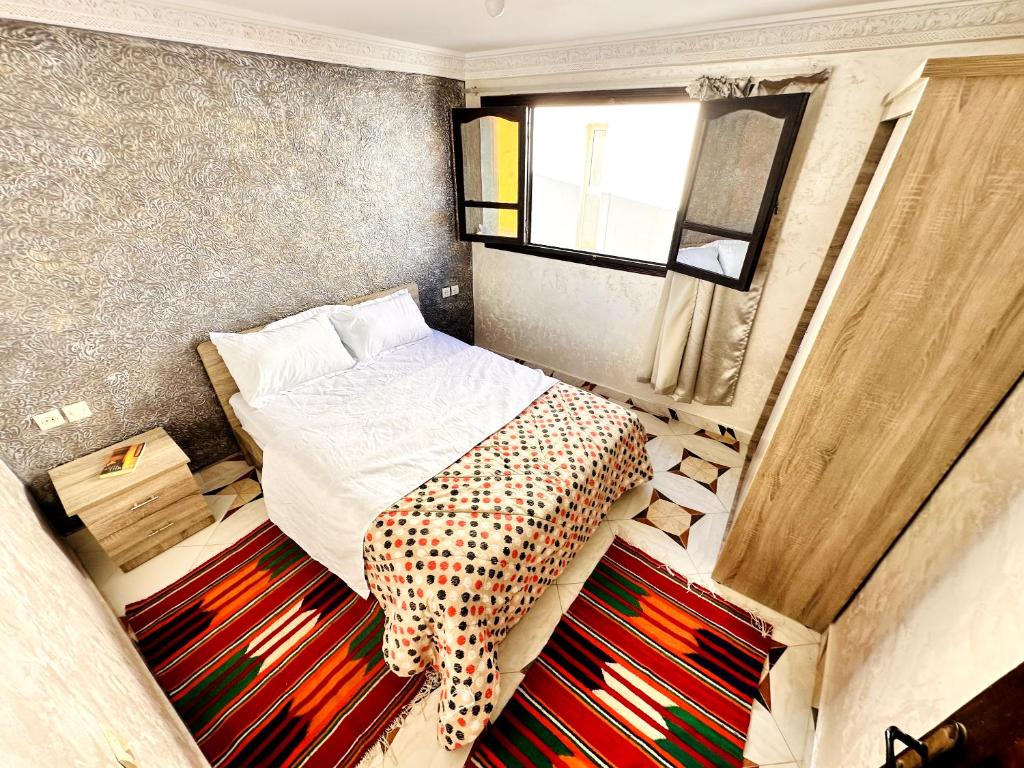 Postel nebo postele na pokoji v ubytování Atlas Hostel Taghazout