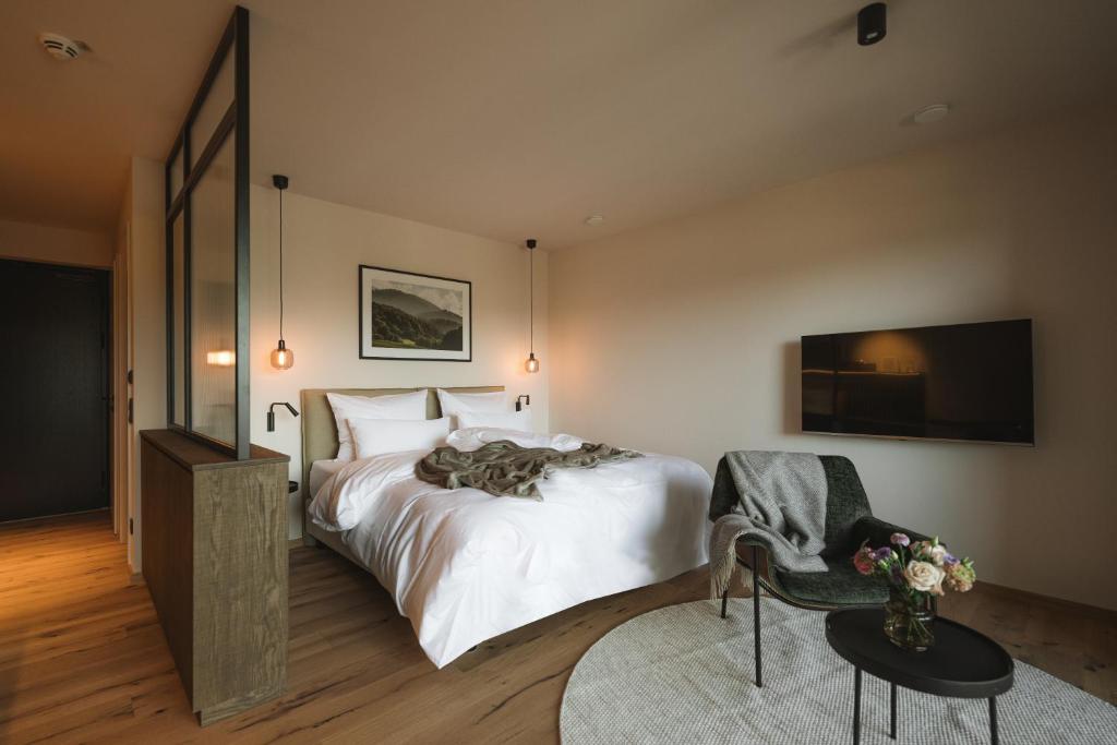 Postel nebo postele na pokoji v ubytování Agrad Chalets