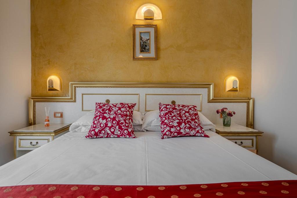 Postel nebo postele na pokoji v ubytování Hotel King