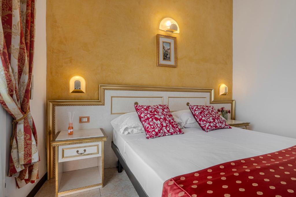Postel nebo postele na pokoji v ubytování Hotel King