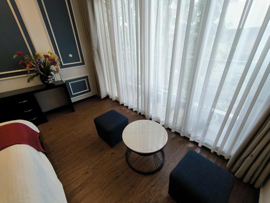 Posezení v ubytování Eclipse Legend Hotel