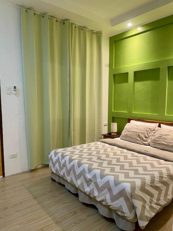 Postel nebo postele na pokoji v ubytování Bakoko Garden