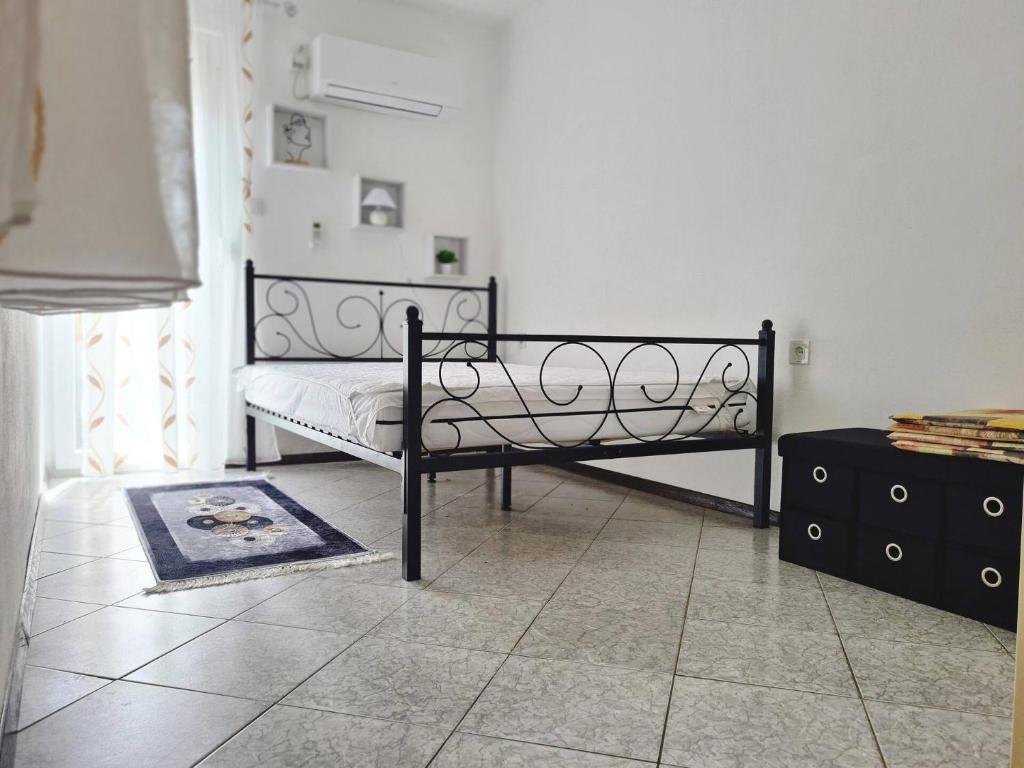 Postel nebo postele na pokoji v ubytování Apartments Bugi