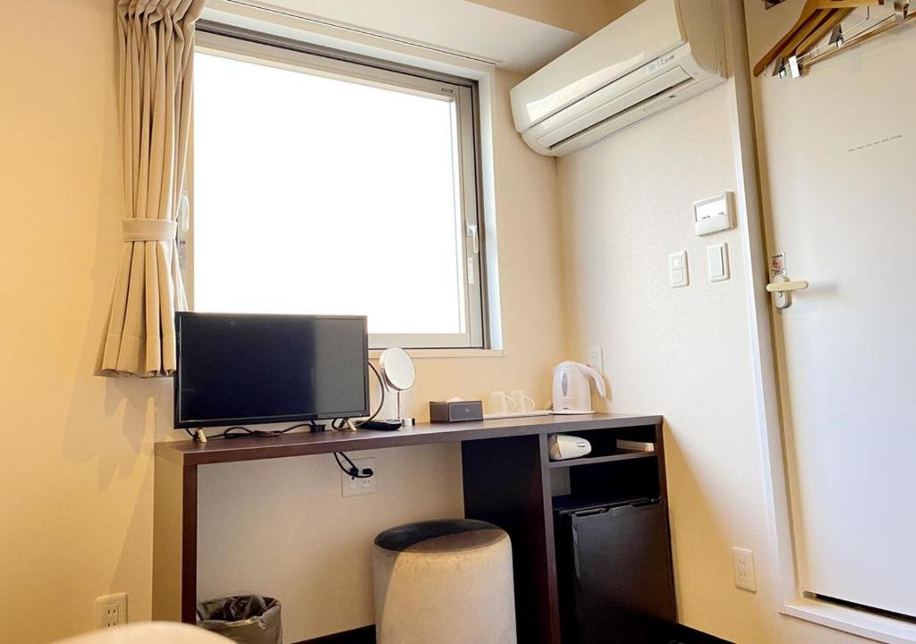 TV a/nebo společenská místnost v ubytování Floral Hotel · SakaisuJi-Honmachi Osaka