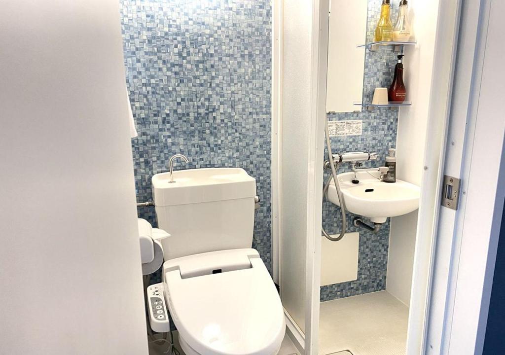 Koupelna v ubytování Floral Hotel · SakaisuJi-Honmachi Osaka