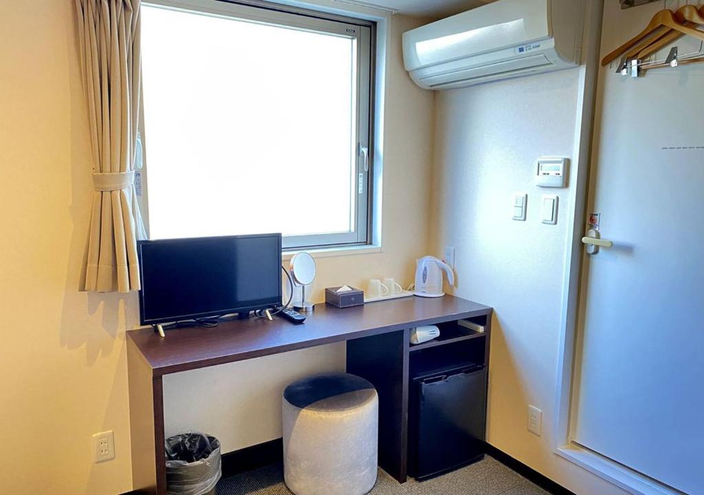 TV a/nebo společenská místnost v ubytování Floral Hotel · SakaisuJi-Honmachi Osaka