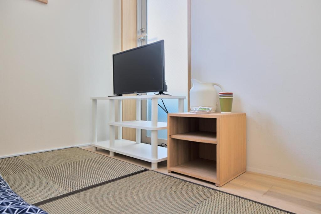 TV a/nebo společenská místnost v ubytování Kyo-wa Hotel