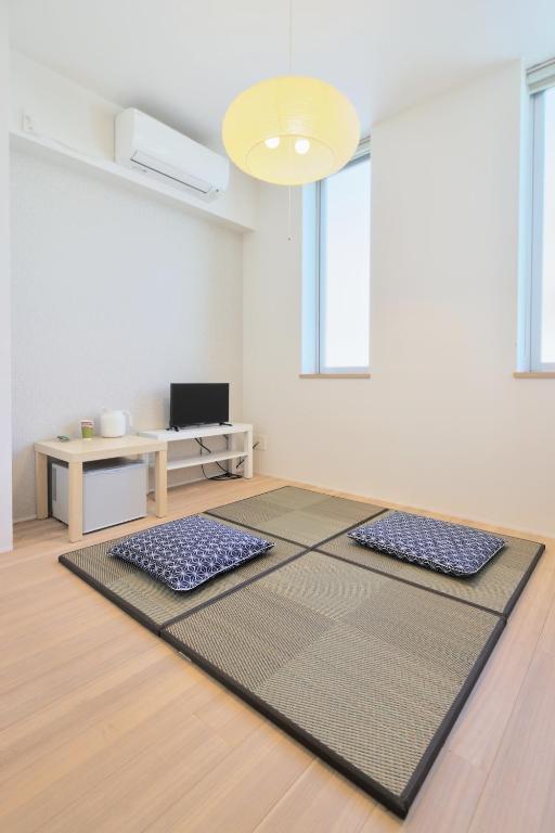 TV a/nebo společenská místnost v ubytování Kyo-wa Hotel