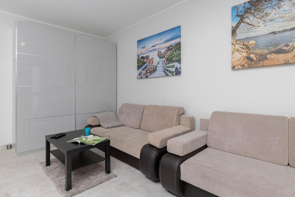 Posedenie v ubytovaní Apartament z widokiem na morze obok Parku Millenium w Gdańsku by Noclegi Renters