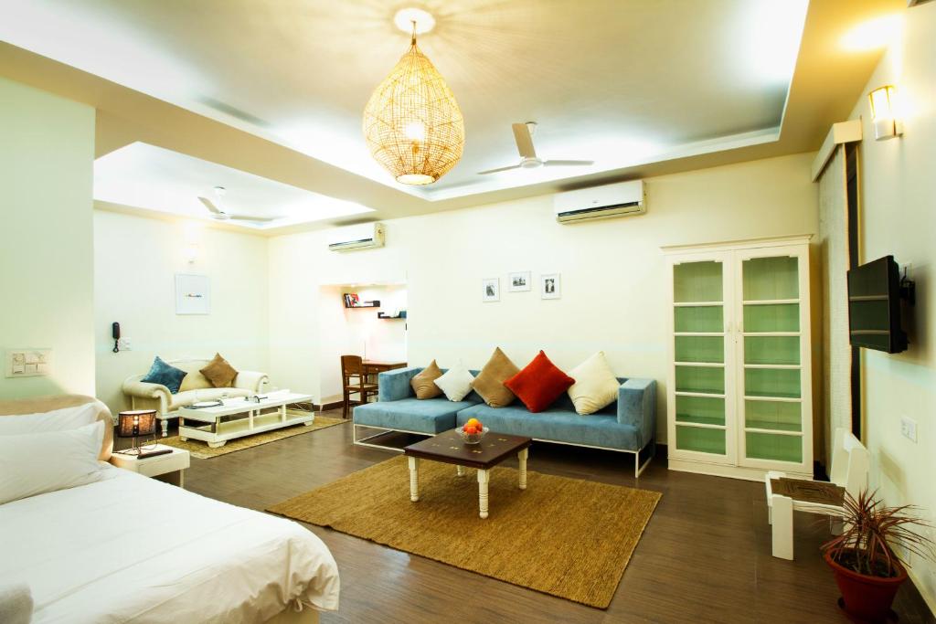 Postel nebo postele na pokoji v ubytování Anara Service Apartments - Greater Kailash Part II