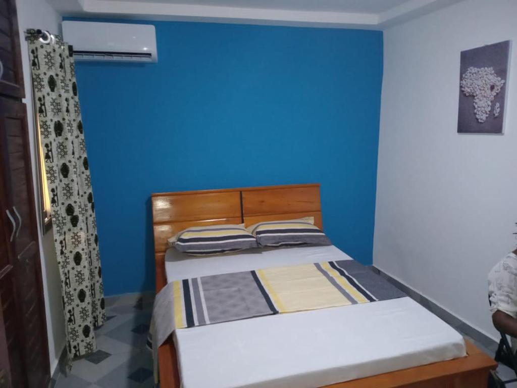 En eller flere senge i et værelse på Kimtoou résidence