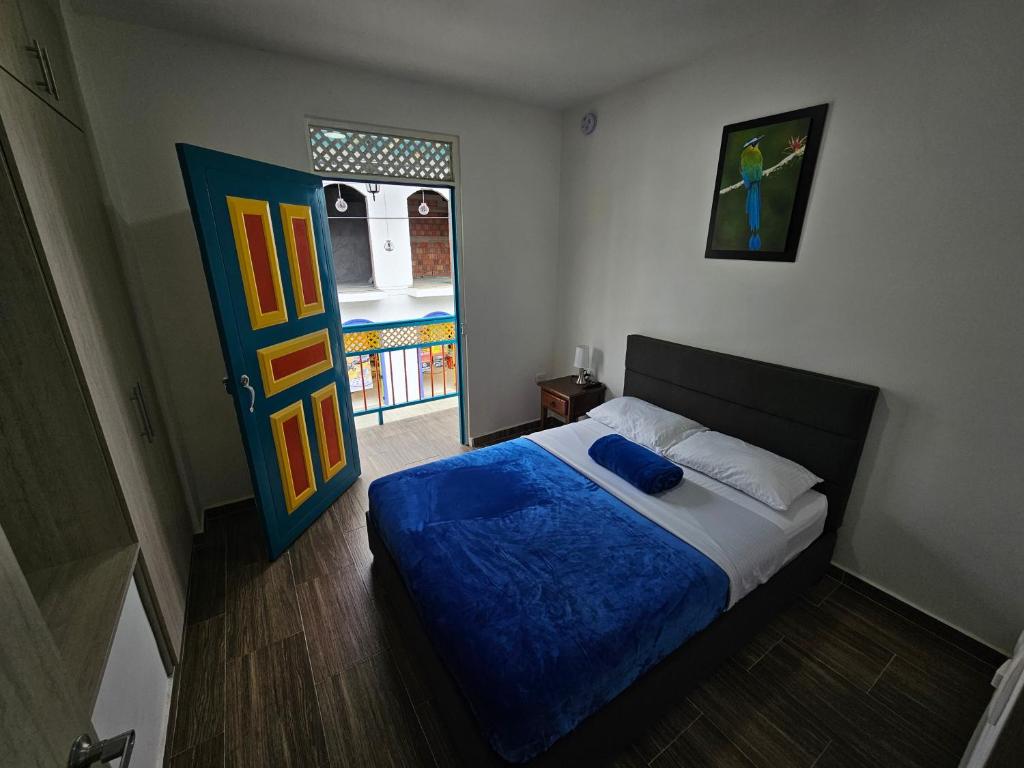 Postel nebo postele na pokoji v ubytování APARTAHOTEL DON BELI