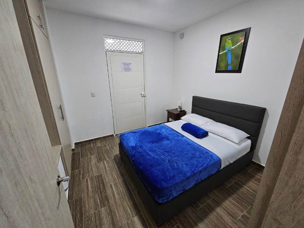 Postel nebo postele na pokoji v ubytování APARTAHOTEL DON BELI