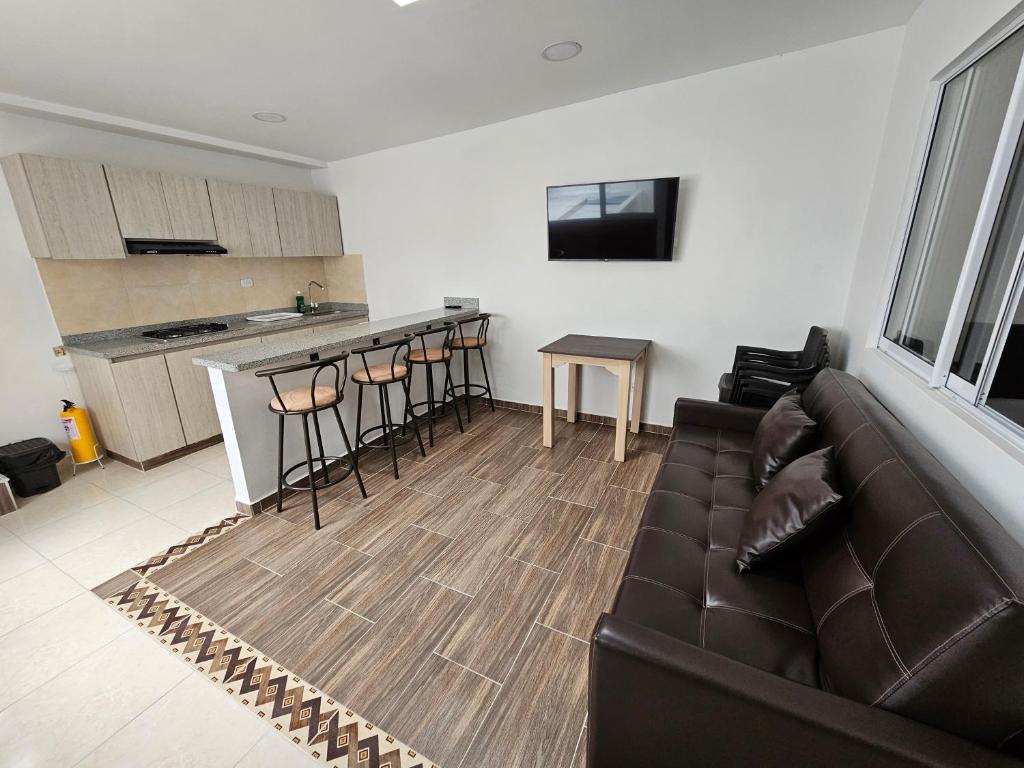 Kuchyň nebo kuchyňský kout v ubytování APARTAHOTEL DON BELI