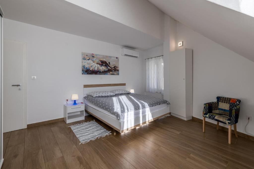 Postel nebo postele na pokoji v ubytování Sara Apartment