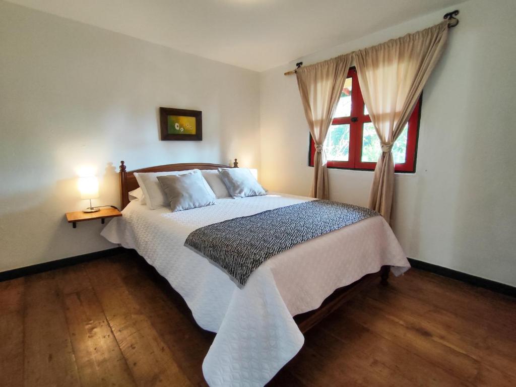Ένα ή περισσότερα κρεβάτια σε δωμάτιο στο Casa Laureles