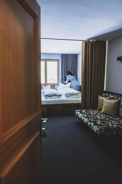 Posteľ alebo postele v izbe v ubytovaní Hotel Gasthof KREUZ