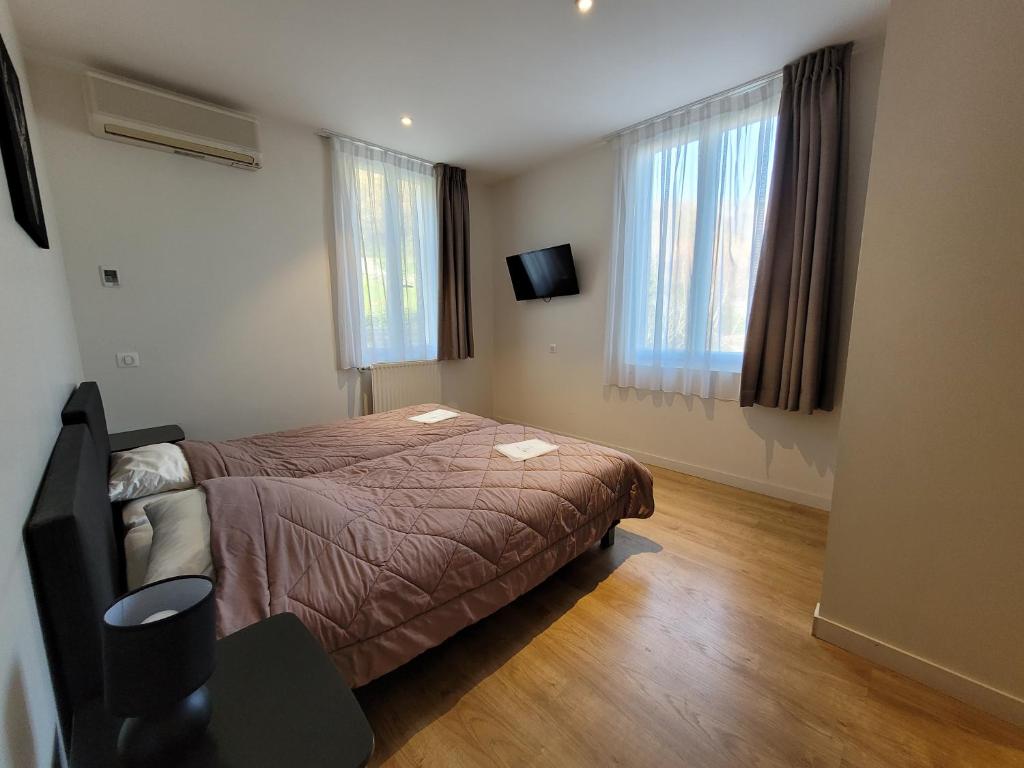 Postel nebo postele na pokoji v ubytování Résidence Andurans - Pyrénées Resort