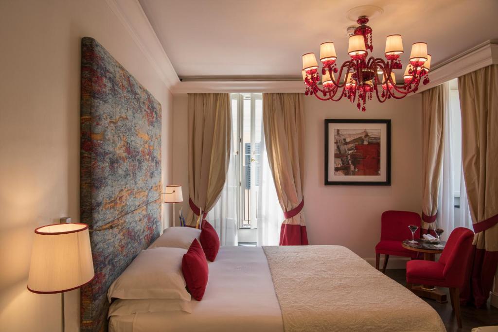 Postel nebo postele na pokoji v ubytování Hotel d’Inghilterra Roma – Starhotels Collezione