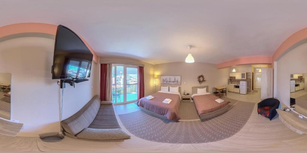 TV a/nebo společenská místnost v ubytování Hotel Vasilis Nafplio