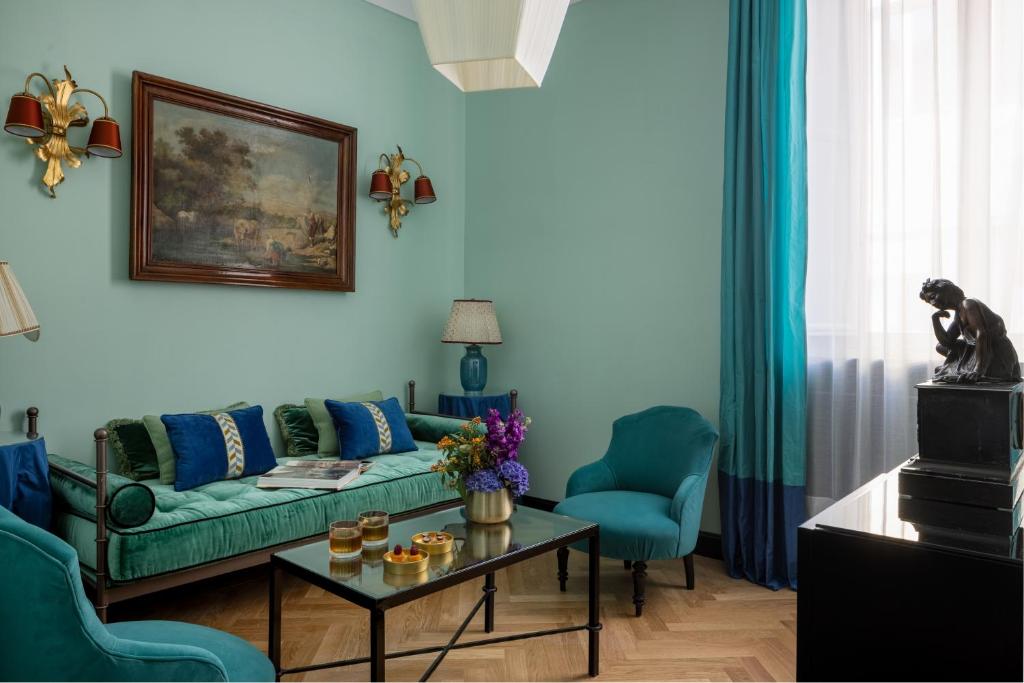 Posezení v ubytování Hotel d’Inghilterra Roma – Starhotels Collezione