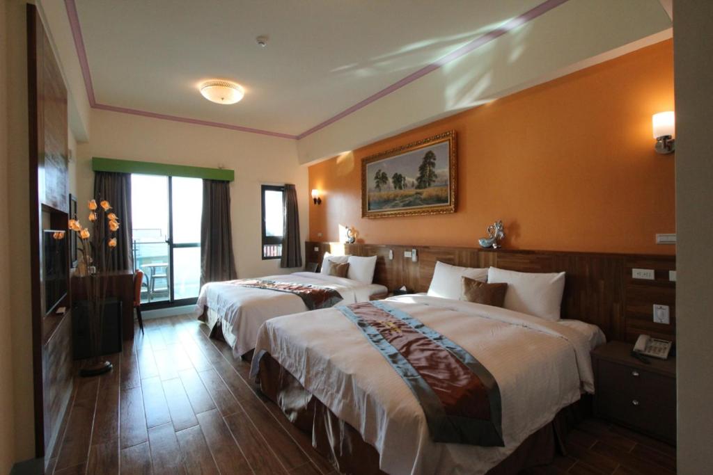 Postel nebo postele na pokoji v ubytování Emilia Resort I