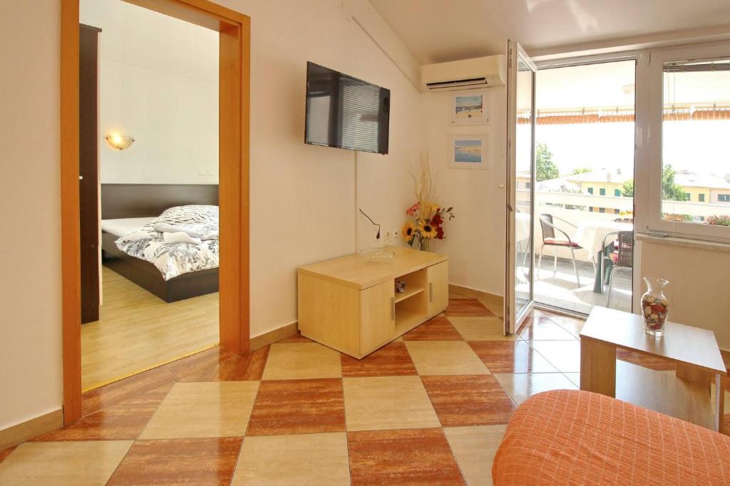 Posteľ alebo postele v izbe v ubytovaní Apartments Aquarium Dorcic