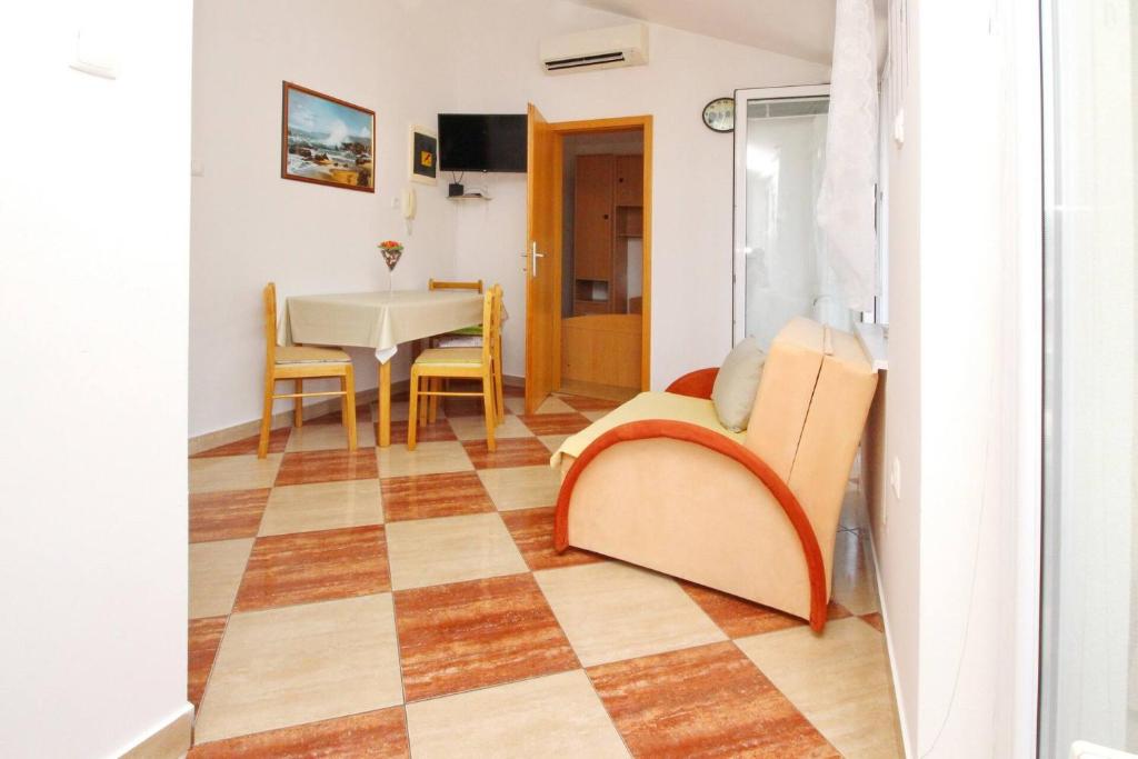 Televízia a/alebo spoločenská miestnosť v ubytovaní Apartments Aquarium Dorcic