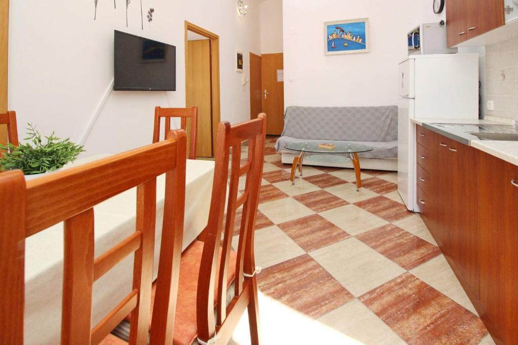 Kuchyňa alebo kuchynka v ubytovaní Apartments Aquarium Dorcic