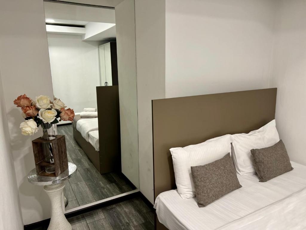 Postel nebo postele na pokoji v ubytování YVN Tumanyan Hotel