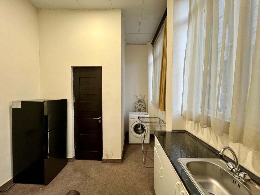 Kuchyň nebo kuchyňský kout v ubytování YVN Tumanyan Hotel