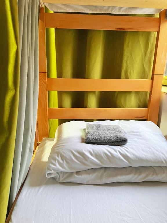 Postel nebo postele na pokoji v ubytování Eleven Hostel