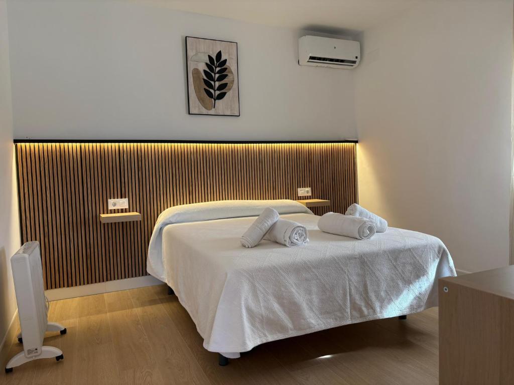 Ένα ή περισσότερα κρεβάτια σε δωμάτιο στο Casa rural Los Girasoles