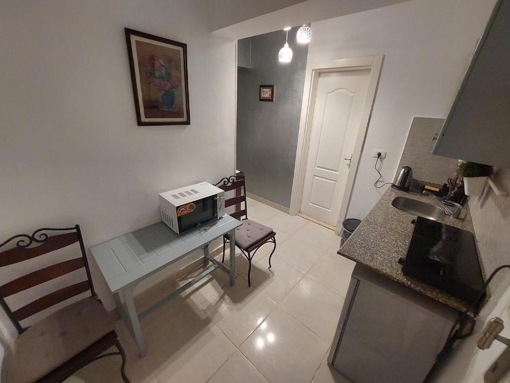Kuchyň nebo kuchyňský kout v ubytování Studio in Delta Sharm Resort