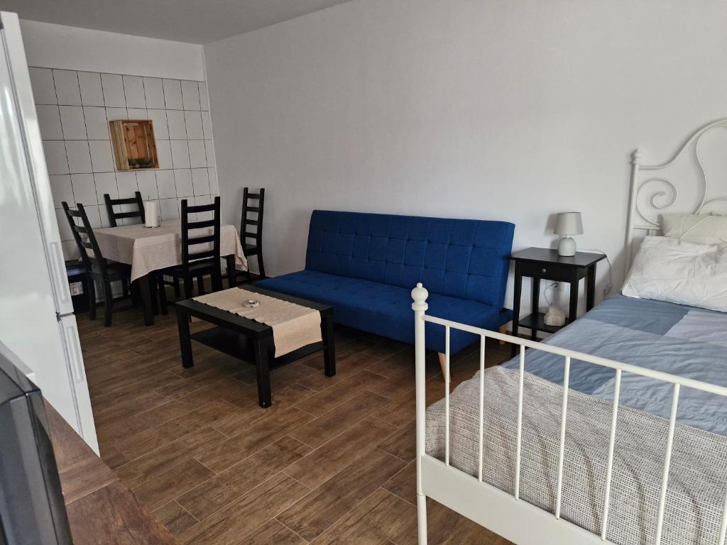 Postel nebo postele na pokoji v ubytování Las palmeras B