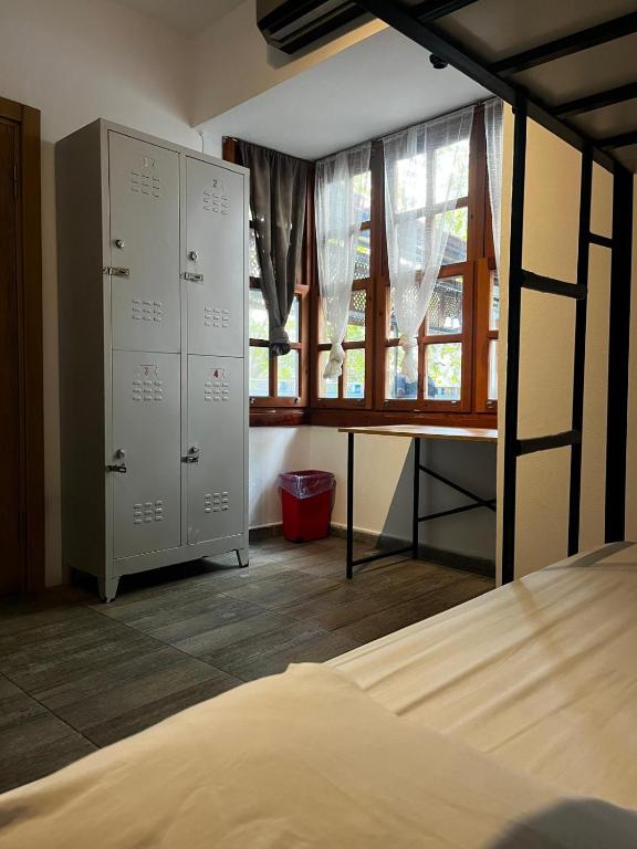Postel nebo postele na pokoji v ubytování Kuyu Beergarden Hostel