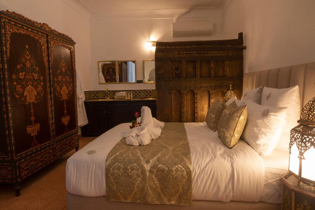 Postel nebo postele na pokoji v ubytování Riad O'Zeen