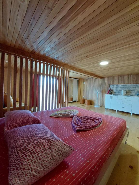 Postel nebo postele na pokoji v ubytování Mtirala House