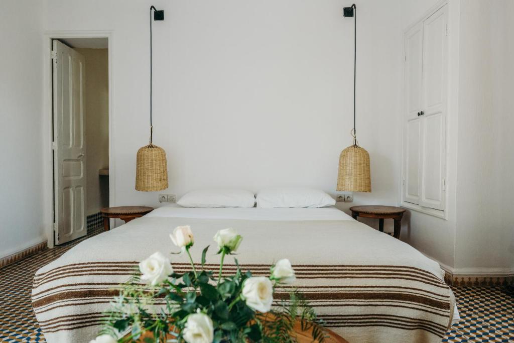 Postel nebo postele na pokoji v ubytování Tangaro Hip Hotel & Spa