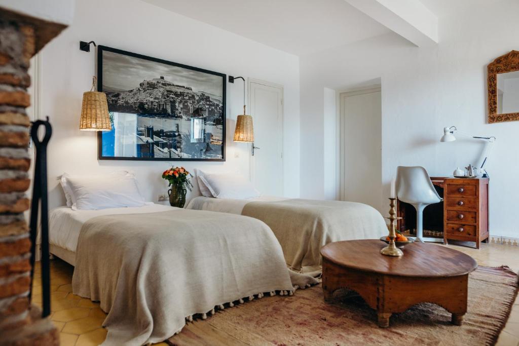 Postel nebo postele na pokoji v ubytování Tangaro Hip Hotel & Spa