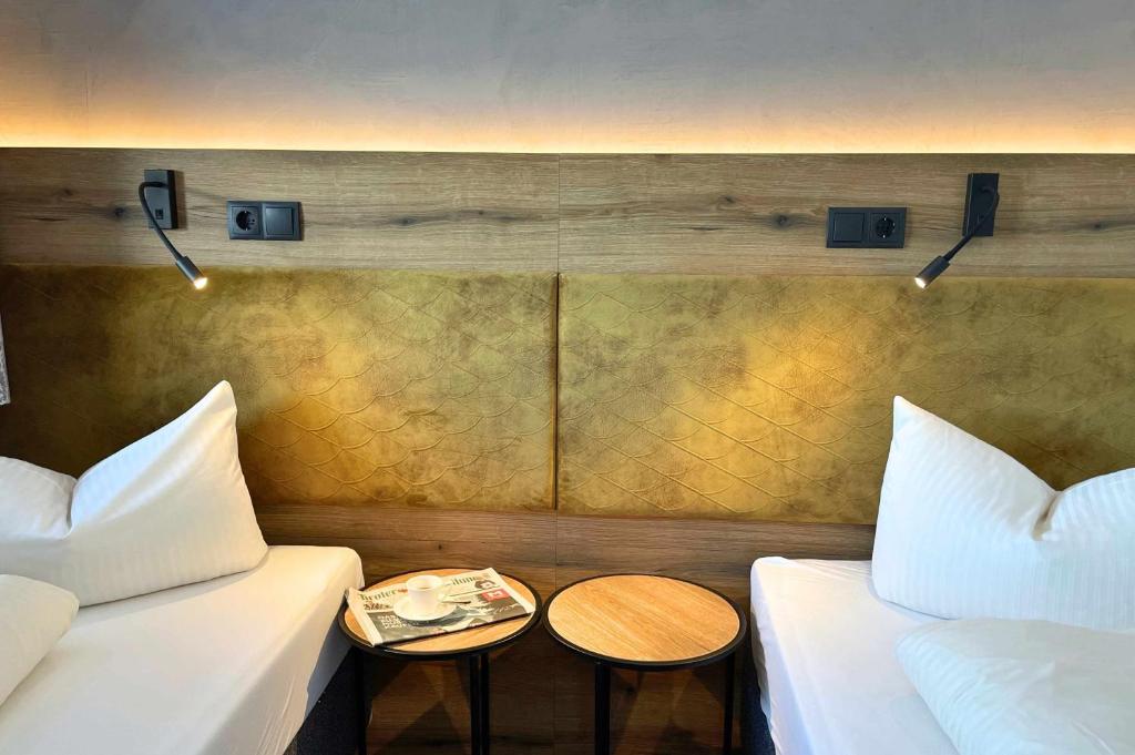 Postel nebo postele na pokoji v ubytování Gästehaus Wöberlerhof