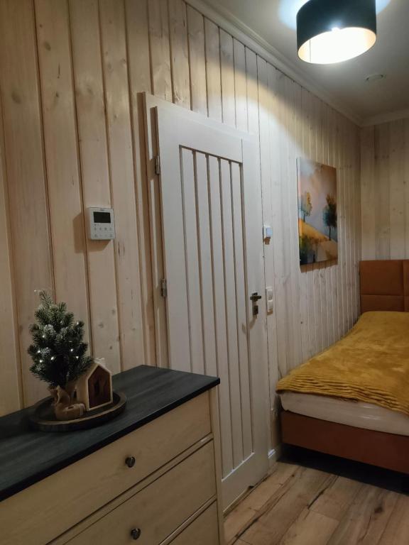 Posteľ alebo postele v izbe v ubytovaní Domek Relaks pod Śnieżką