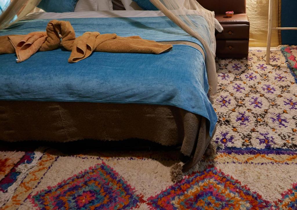 Postel nebo postele na pokoji v ubytování Desert Experience Glamping