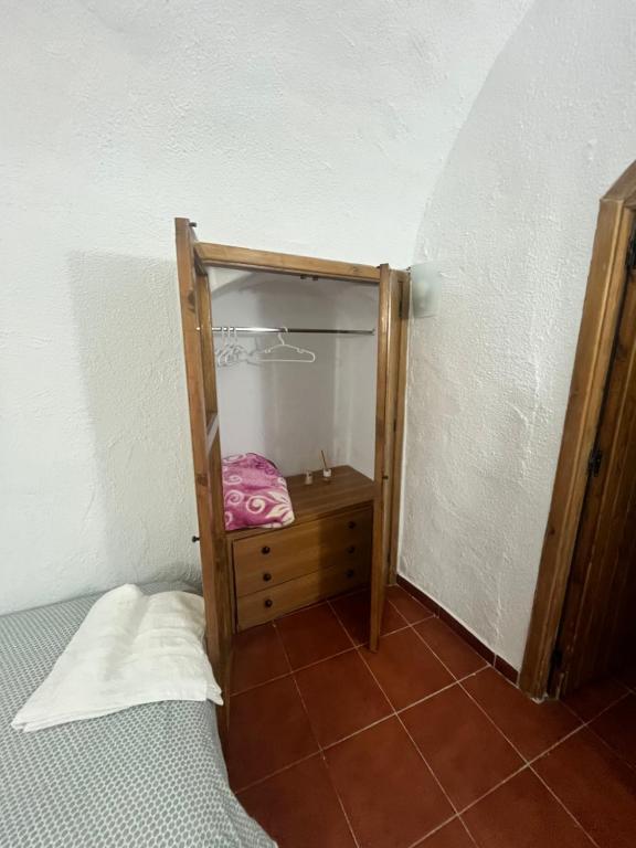 Postel nebo postele na pokoji v ubytování Casa Cueva la estación