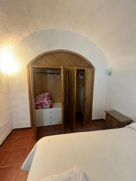 Postel nebo postele na pokoji v ubytování Casa Cueva la estación