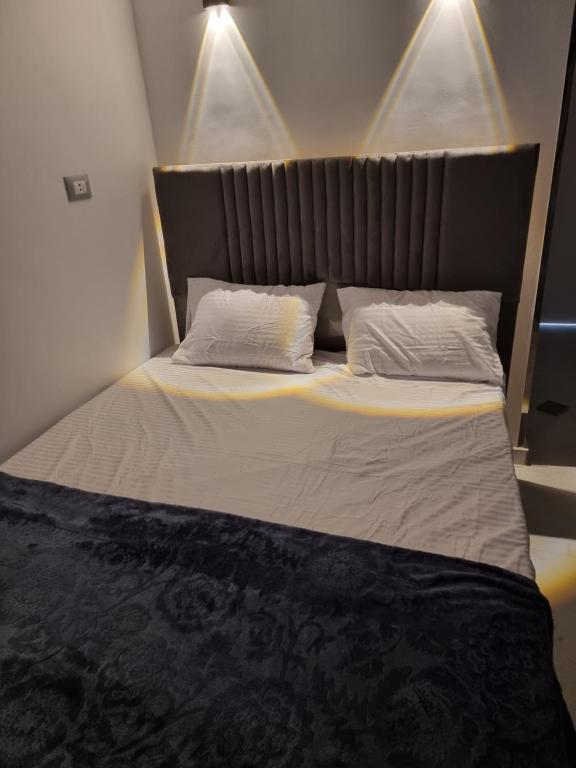 Postel nebo postele na pokoji v ubytování Baba Dool