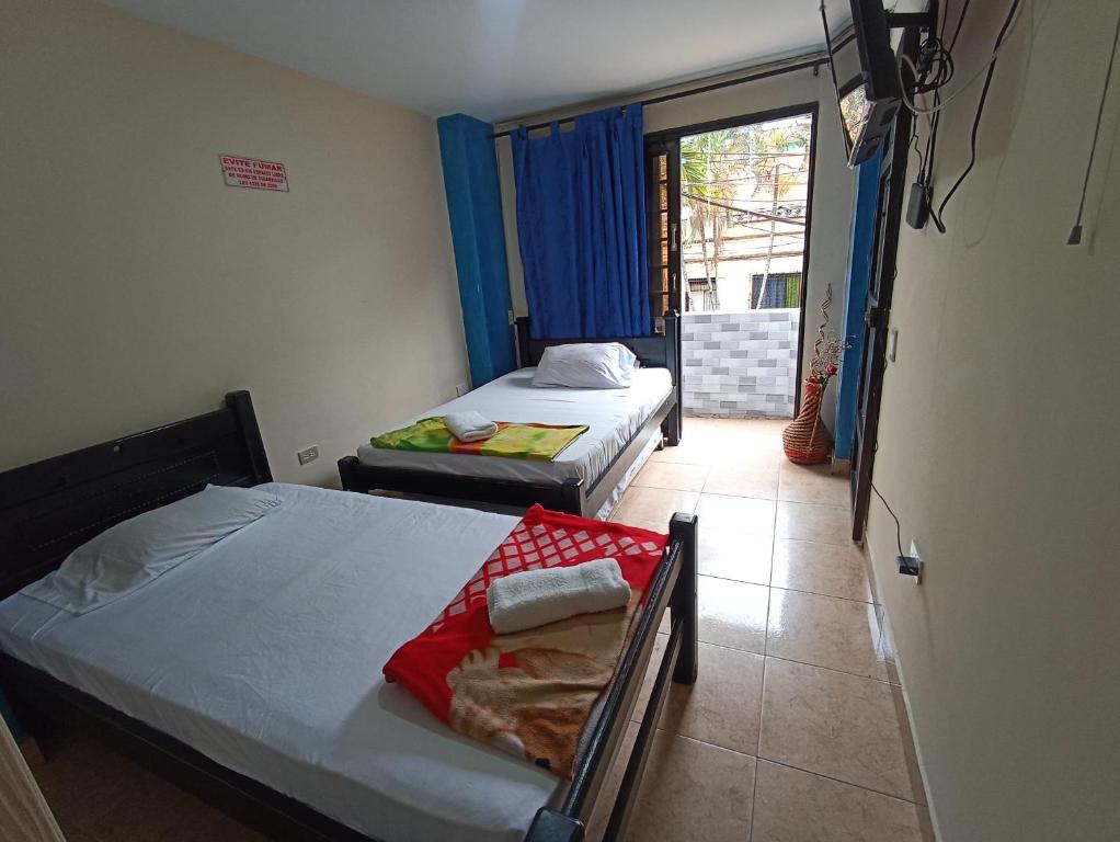 Postel nebo postele na pokoji v ubytování Hotel San Vicente